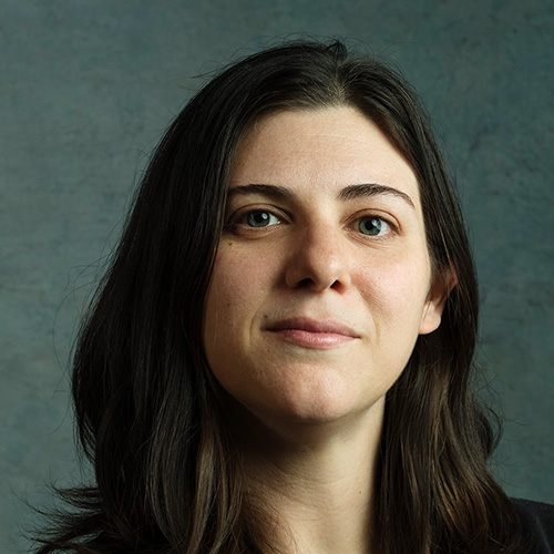 Headshot of woman with shoulder length brown hair and brown eyes