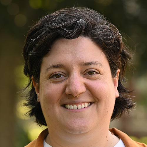 Person with short brown hair and light skintone