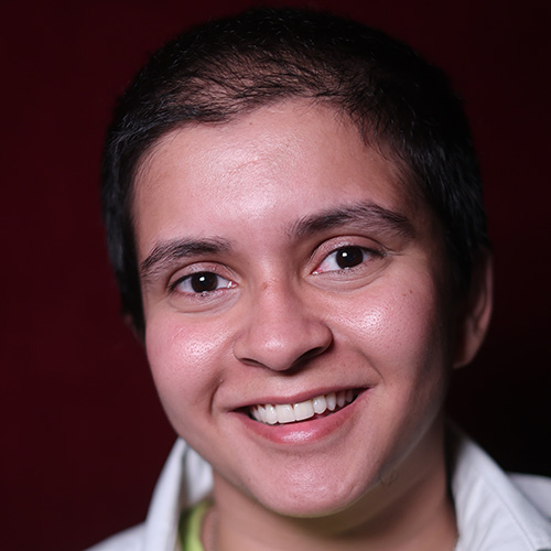 headshot of they/he