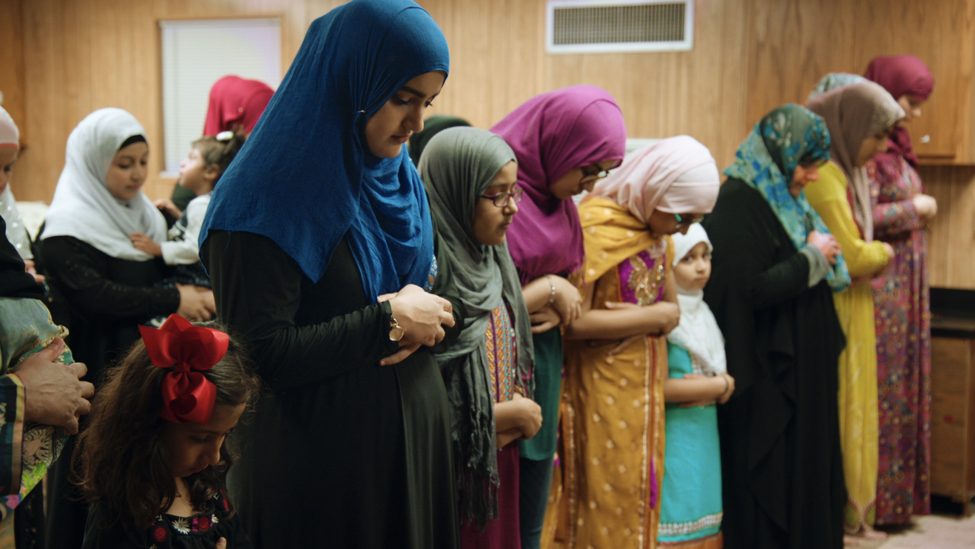 The women of the Victoria Islamic Center hold their afteroon prayers.