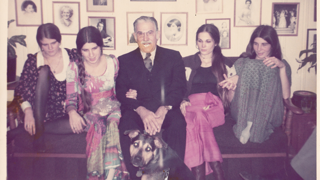 Old photo of family sitting on couch