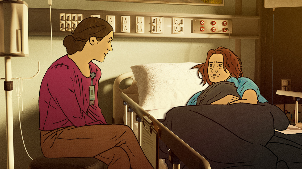 Dr sitting and talking to a patient in a hospital