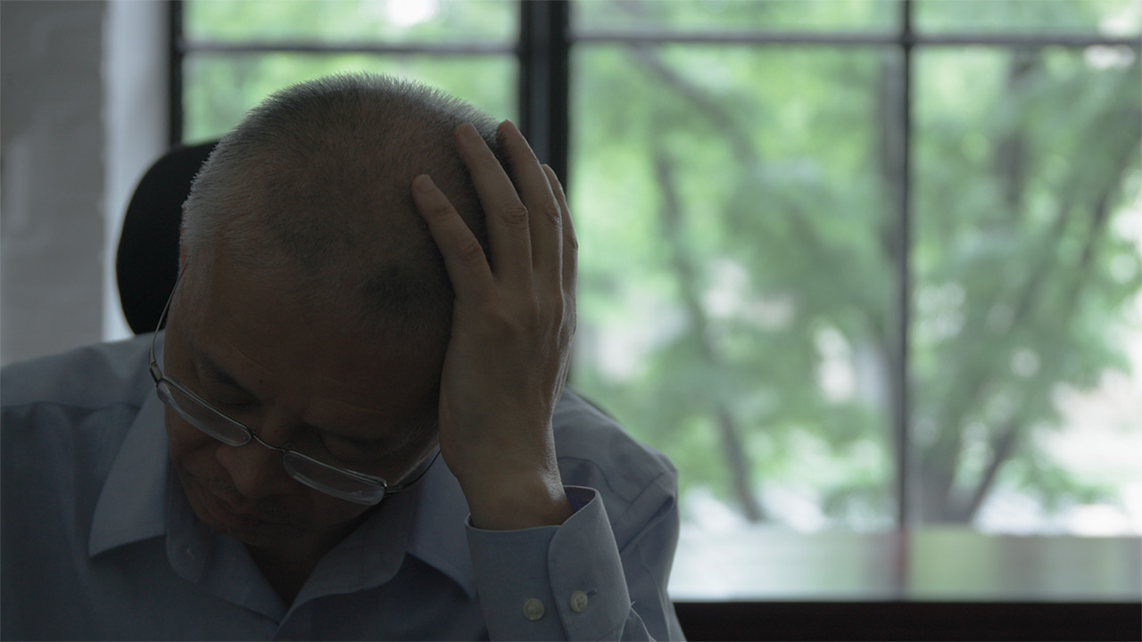 Man with his head in his hands